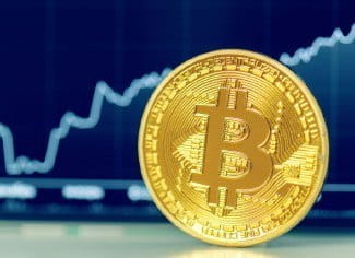 The volatility of bitcoin shown by a price index and a large golden coin representing the bitcoin currency