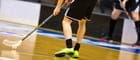 A floorball player's legs