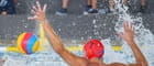 A water polo player with a ball